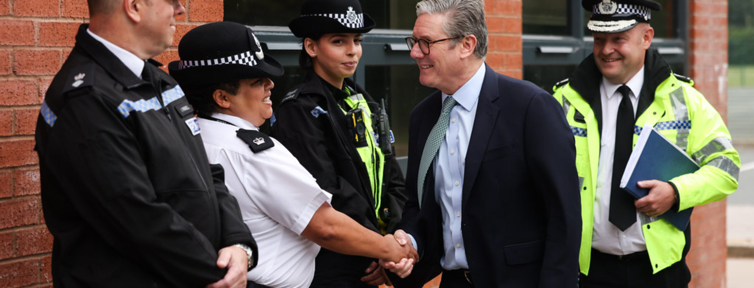 A photo of Keir Starmer meeting police staff