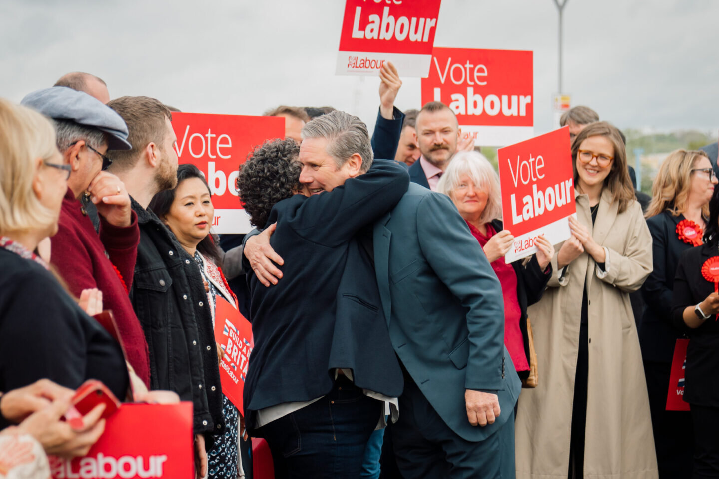 Keir Starmer celebrating with Labour campaigners
