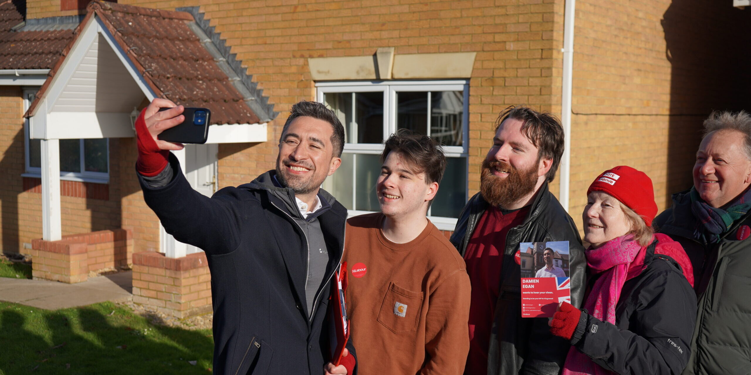 Labour candidate in Kingswood Damien Egan taking a selfie with four Labour campaigners