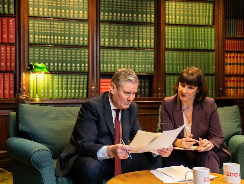 Keir Starmer and Rachel Reeves sit side by side preparing to respond to the Budget