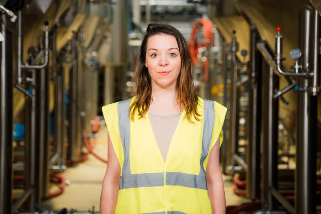 Young woman wearing a high visibility vest.