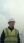 Prime Minister Keir Starmer wearing a hard hat and a hi-vis yellow vest.
