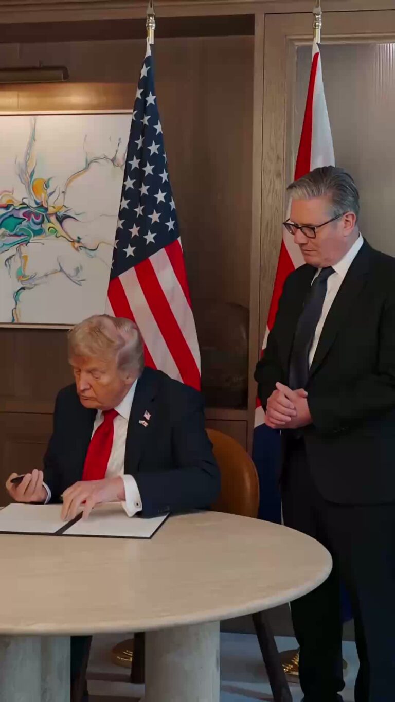 President Trump and Prime Minister Keir Starmer signing an agreement